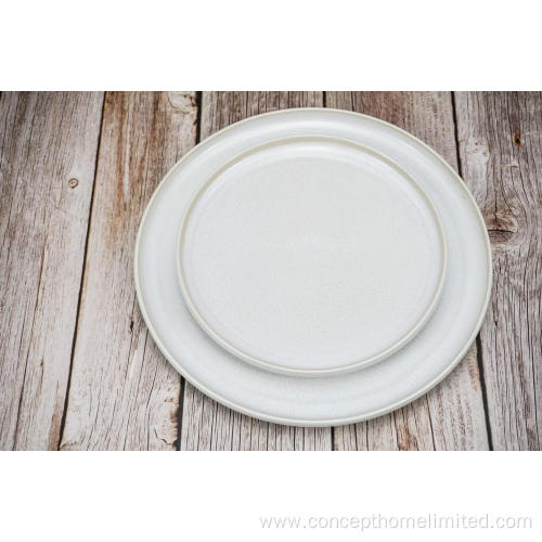 Reactive glazed stoneware dinner set in Creamy white
